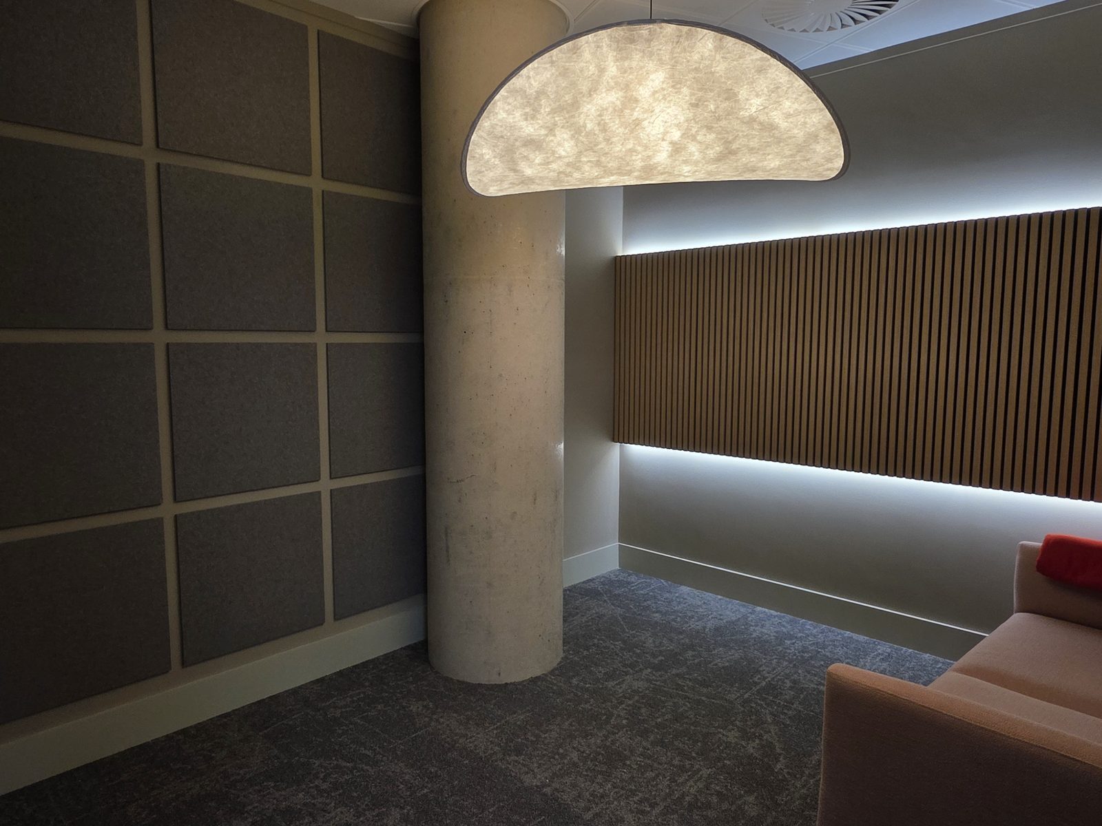 Feature pendant with a concealed LED wall wash